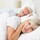 Couple, Focus On Foreground, Morning, Residential Building, Portrait, Mature Women, Women, Females, Mature Men, Men, Males, Snoring, Wake Up, Sound, Domestic Life, Waking up, 50-54 Years, 50-59 Years, Mature Adult, Sleeping, Resting, Covering, Caucasian Ethnicity, Togetherness, Relaxation, Indoors, Looking At Camera, Close-up, Front View, Day, Bedroom, House, Pillow, Duvet, Sheet, Cushion, Bed